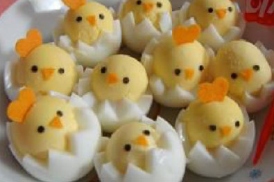 Hardboiled eggs carved into small chicks