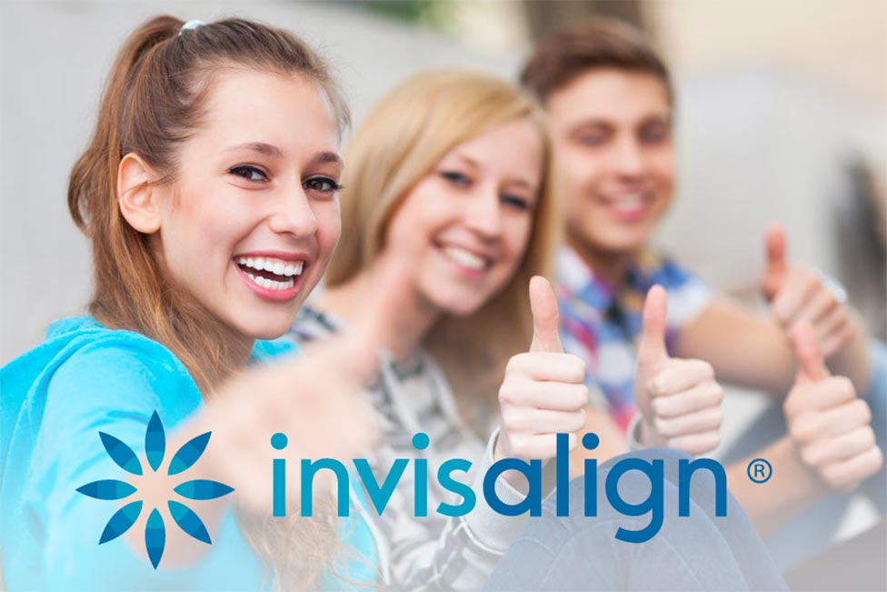 Teens giving Invisalign a thumbs-up!